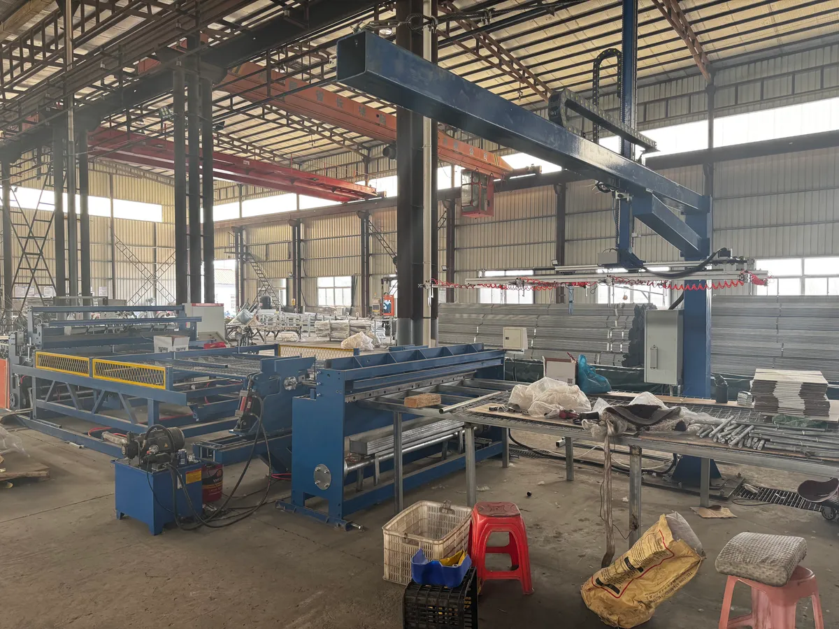 Automated fence mesh production line inside the HJ Fence workshop